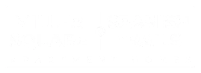 White version of the Miller Square & Spanish Trails Apartment Homes logo, designed for dark or colored backgrounds, showcasing the unified branding of both communities.