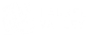 Laurel Valley logo: Abstract white lines in a square, next to the stacked white text "LAUREL VALLEY".
