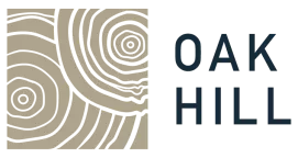 Oak Hill logo with stylized concentric rings resembling wood grain on a beige background.