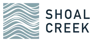 Shoal Creek logo: blue-grey square with black wavy lines next to dark grey text 'SHOAL CREEK'.