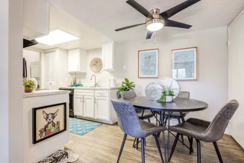 Santana Ridge kitchen nook with bright overhead lighting and ceiling fan.