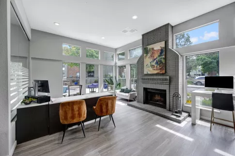 Warm fireplace located within the clubhouse for residents to enjoy.