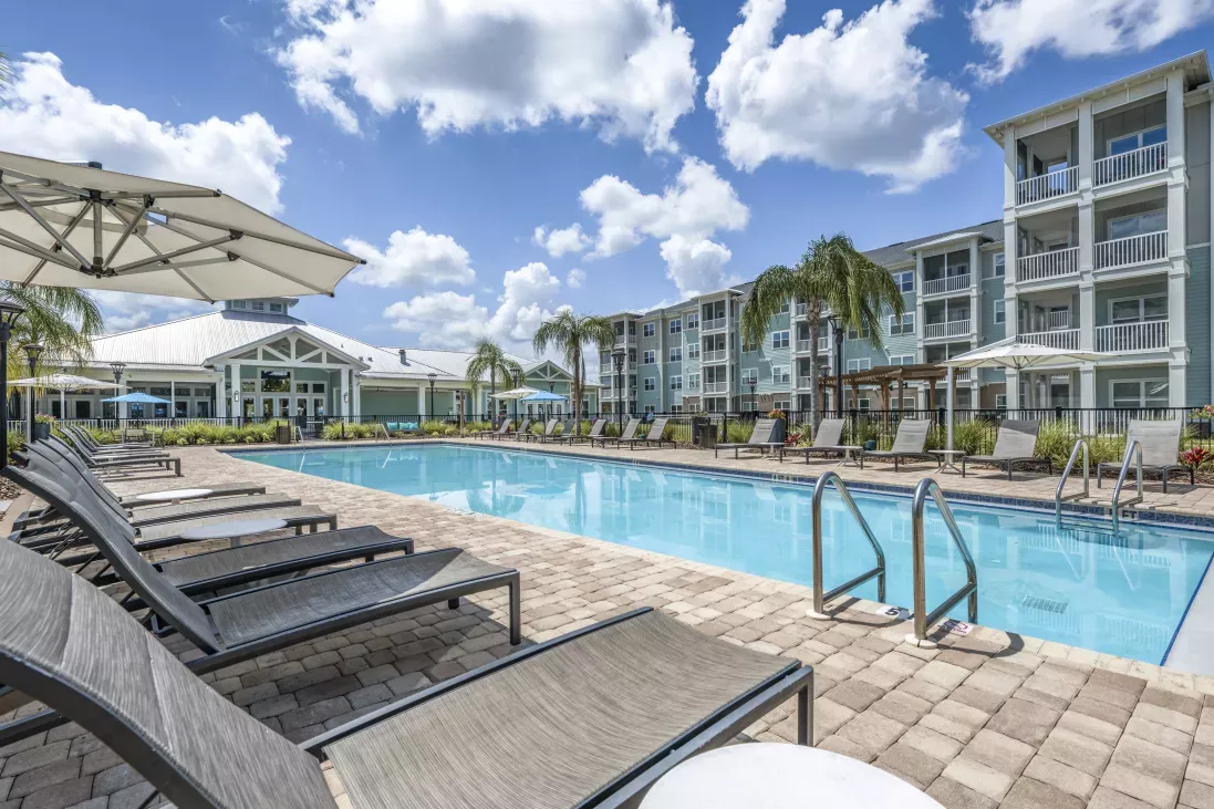 Parc At Wesley Chapel's large, resort style pool with ample seating and conveniently located near parking.