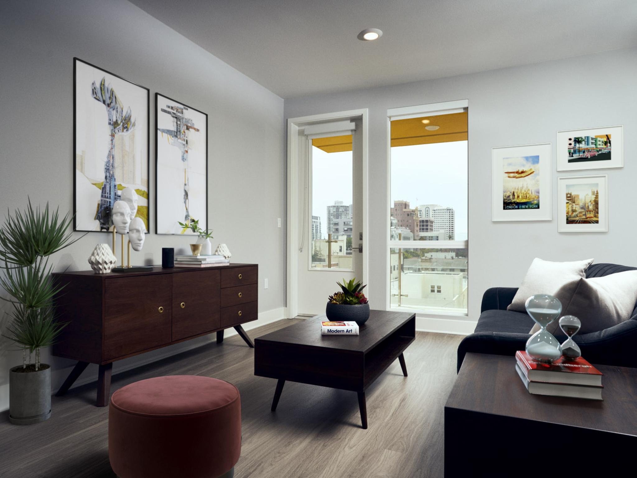Modern living room with city views, mid-century furnishings, and decorative wall art.