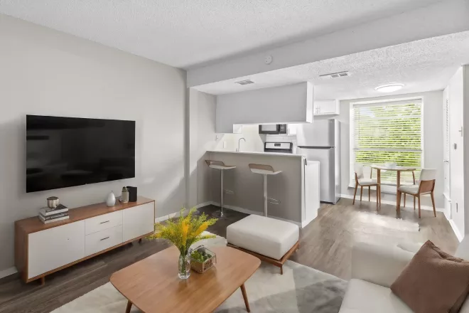 Bright, open kitchen and living room for residents to enjoy.